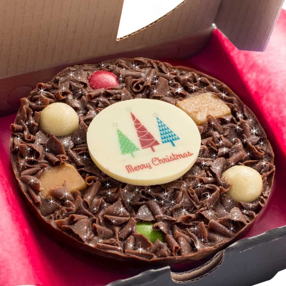 Close up of 4" Mini Christmas Chocolate Pizza with Merry Christmas Plaque